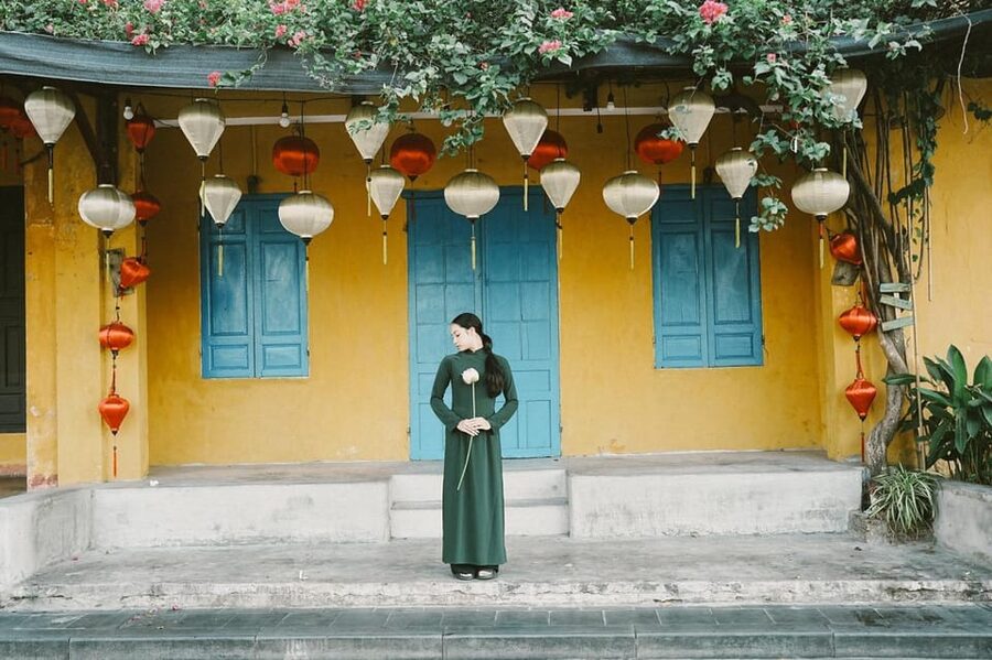 Ao Dai Photography: Traditional Attire Capture in Hoi An - Walking through Hoi An’s yellow lanes