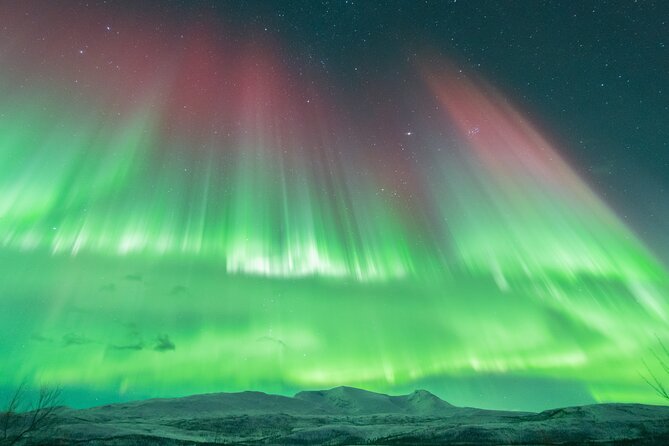 Aurora Hunt with the campfire and professional photographer - Stop three: the best chance for clear skies