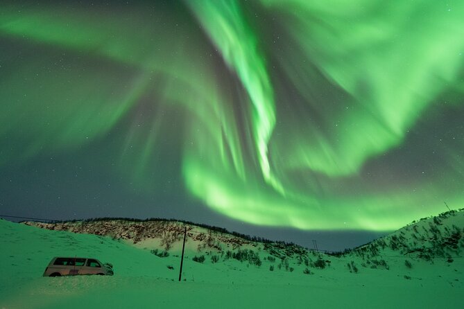 Aurora Hunt with the campfire and professional photographer - Staying warm in Tromso’s winter dark