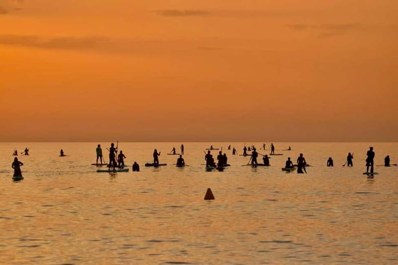 Barcelona: Paddleboarding at Sunrise. Includes: instructor, photos, equipment - A short walk to the Mediterranean