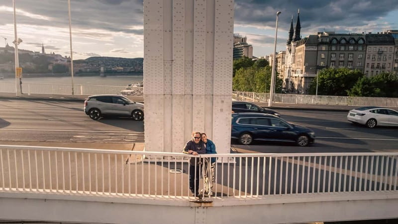 Budapest: private drone photo session - Crossing Liberty Bridge with the camera overhead