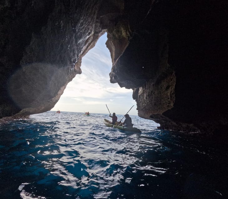Cala en Porter: Menorca Caves Kayaking Tour & GoPro Photos - Sea caves, rock formations, and the light cave