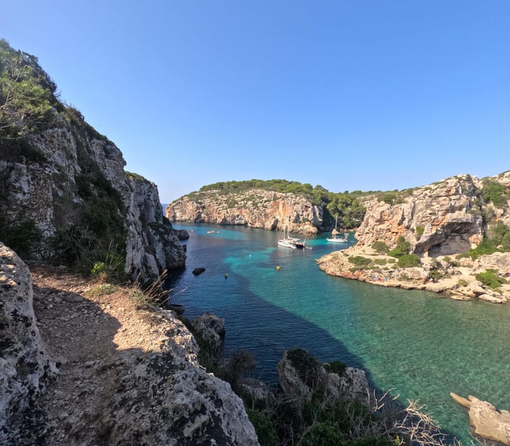 Cala en Porter: Menorca Caves Kayaking Tour & GoPro Photos - Paddling beneath Menorca’s cliffs