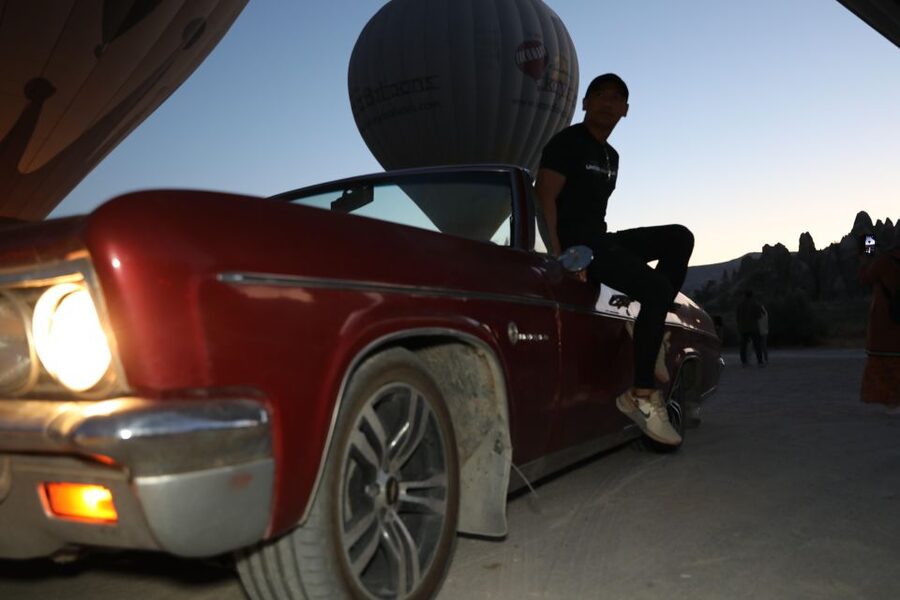 Cappadocia Photo Shoot with Classic Car and Flying Dress - Rose Valley brings warmer color