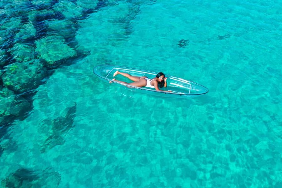 Drone Clear Kayak Barbados Photoshoot - Entering the Clear Kayak in Three Feet of Water