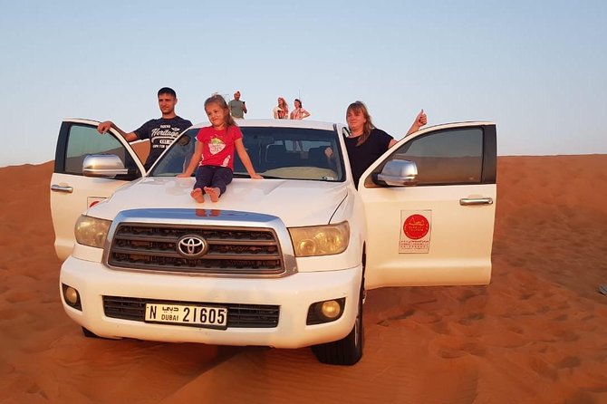 Dubai Half day Desert Safari Quad Bike & Flying Dress Photoshoot - BBQ Dinner, Buffet Food, and Unlimited Drinks
