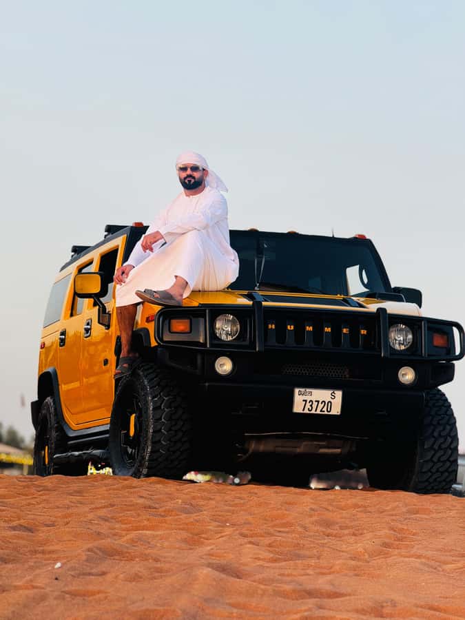 Dubai Hummer Safari Adventure & Traditional Dress Photoshoot - Sandboarding and a short camel ride