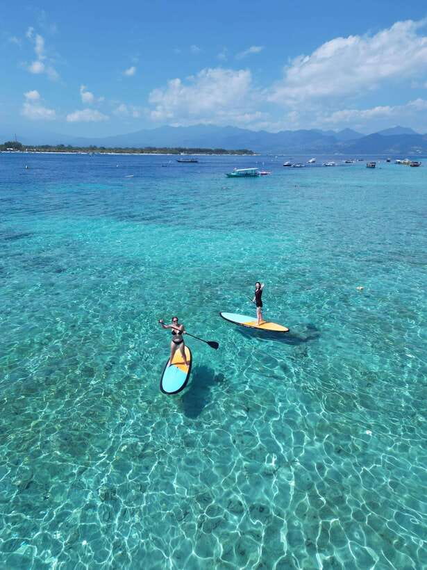 Gili sunrise stand-up paddle boarding (drone photoshoot) - Sunrise, three Gili islands, and a quieter sea