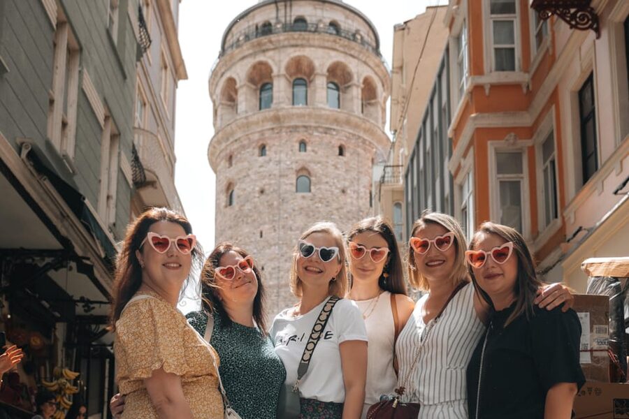 Istanbul: Galata Tower, Bosphorus & Hidden Gems Photo Shoot - Walking toward the Karakoy Umbrellas