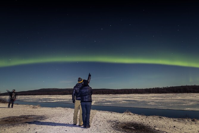 Northern lights hunting photo tour with bbq; small groups - Leaving Rovaniemi’s city glow behind