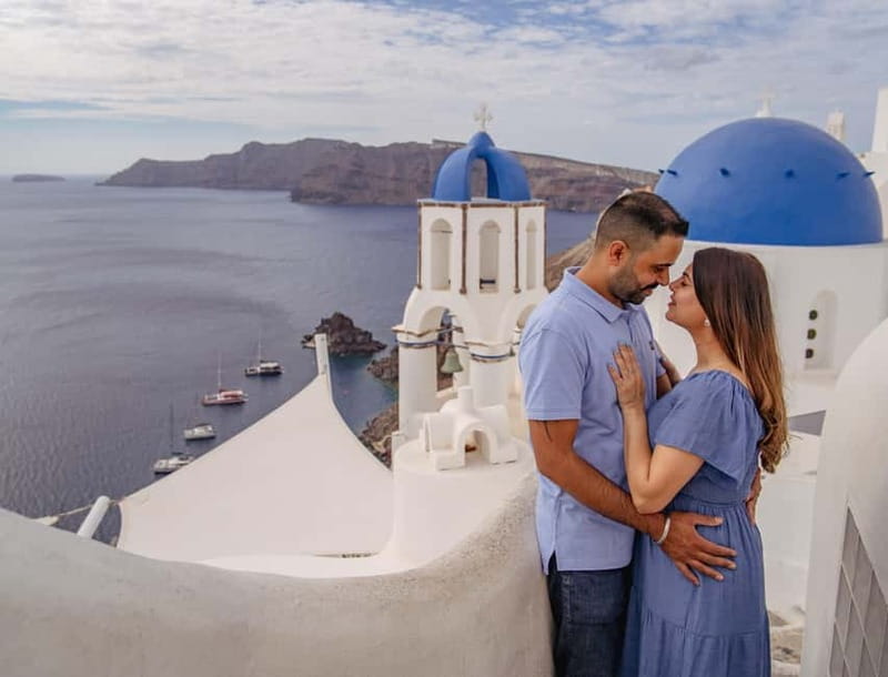 Oia: Couple Photoshoot Seprate Entrance to Blue Dome - The photographer and assistant