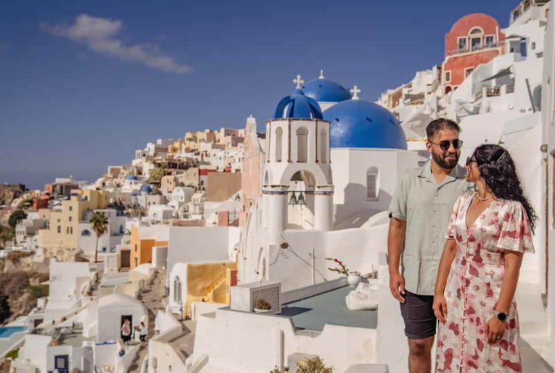Oia: Couple Photoshoot Seprate Entrance to Blue Dome - Timing your pictures around Oia’s crowds