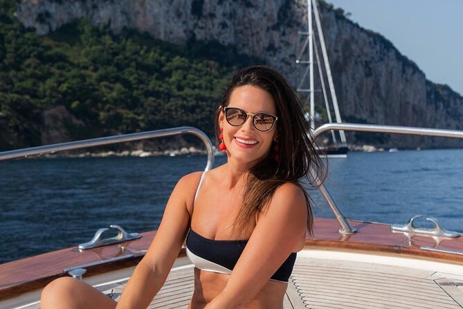 Positano , Praiano to Capri private boat tour - Captains and the feel on board