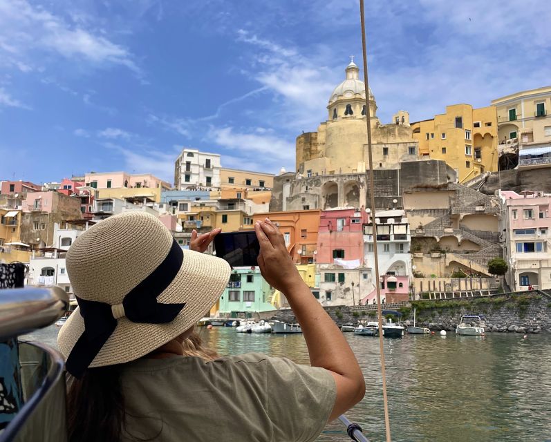 Procida: Boat Tour with Swimming Stops and Underwater Photos - Passing Cala del Pozzo Vecchio and the Cave of the Sea Ox