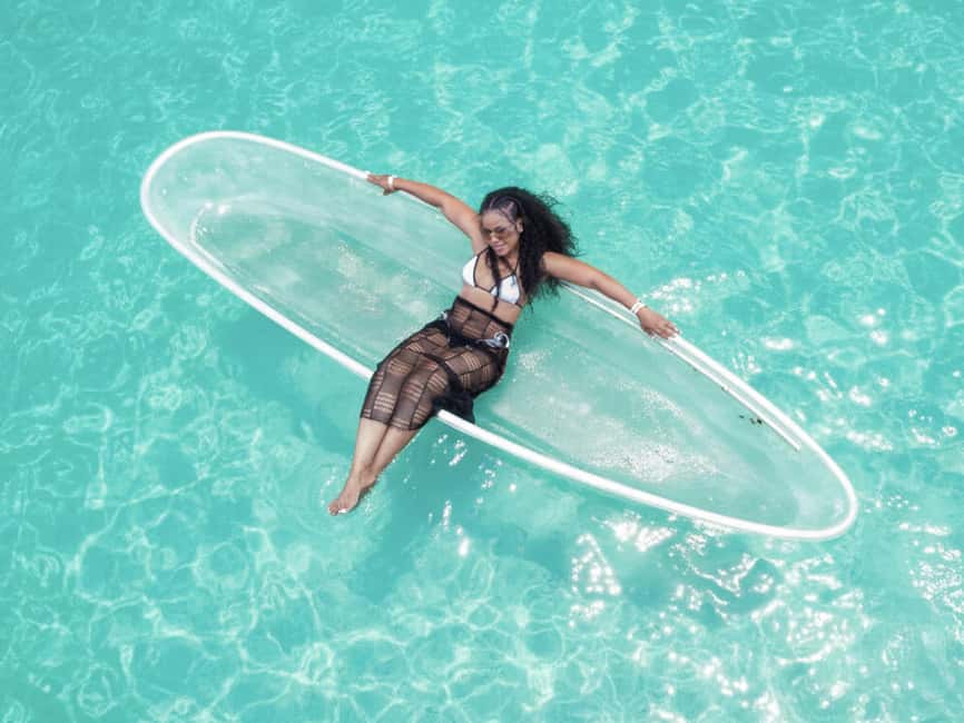Punta Cana: Single Clear Kayak Photoshoot - Entering the clear kayak with in-water support