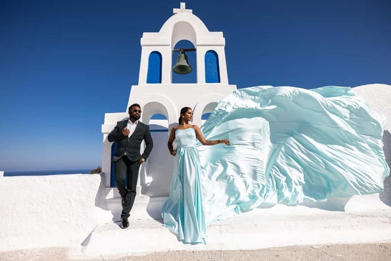 Santorini: Flying Dress Photoshoot <strong>Dress Included</strong> – Key things to know before booking’ /></p>
<ul>
<li><strong>Choose from 15 dress colors:</strong> A gown catalog arrives by email after booking, with sizes from XS to XL and US 0 to 18.</li>
<li><strong>Jessica Mocanu leads the shoot:</strong> She provides pose guidance, works with a personal assistant, and helps create the flowing dress effect.</li>
<li><strong>The 1-hour option stays in Oia:</strong> You meet at the Oia bus terminal and arrange your own transport there.</li>
<li><strong>The 3-hour option covers more of Santorini:</strong> Pickup and drop-off are included, with stops in Oia, near the blue domes, at Black Beach, and in Imerovigli.</li>
<li><strong>You receive 35 to 70 edited photos:</strong> Images are color-corrected and delivered by link within 7 to 10 days.</li>
<li><strong>This suits couples, solo visitors, and friends:</strong> Separate dress arrangements are available for solo or couple bookings and for best-friend groups.</li>
</ul>
<h2>What the Santorini flying dress experience is really like</h2>
<p><img width="800" height="534" decoding="async" src=