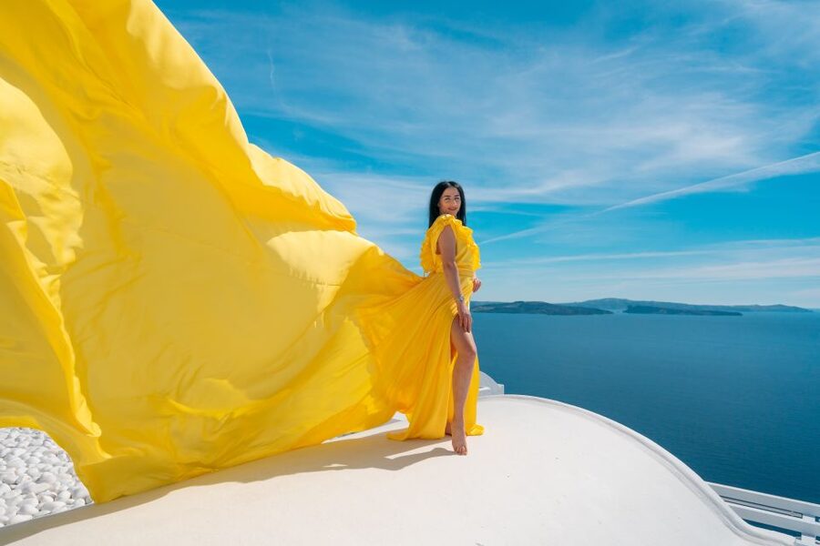 Santorini: Unique Flying Dress Photoshoot Experience - Oia’s blue domes and the photo stop