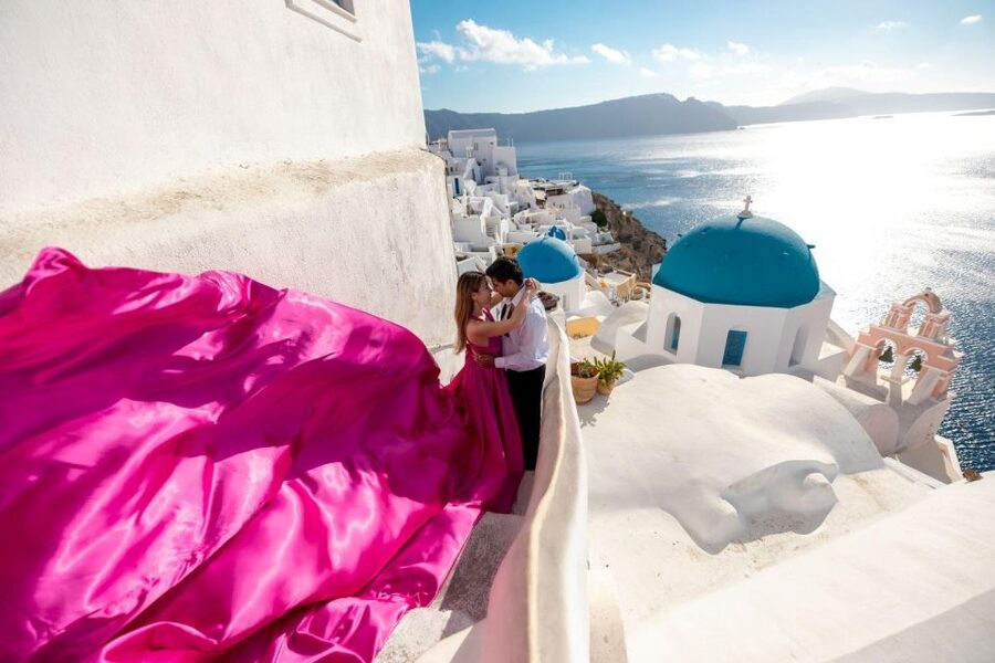 Santorini: Unique Flying Dress Photoshoot Experience - Meeting your photographer near Fira