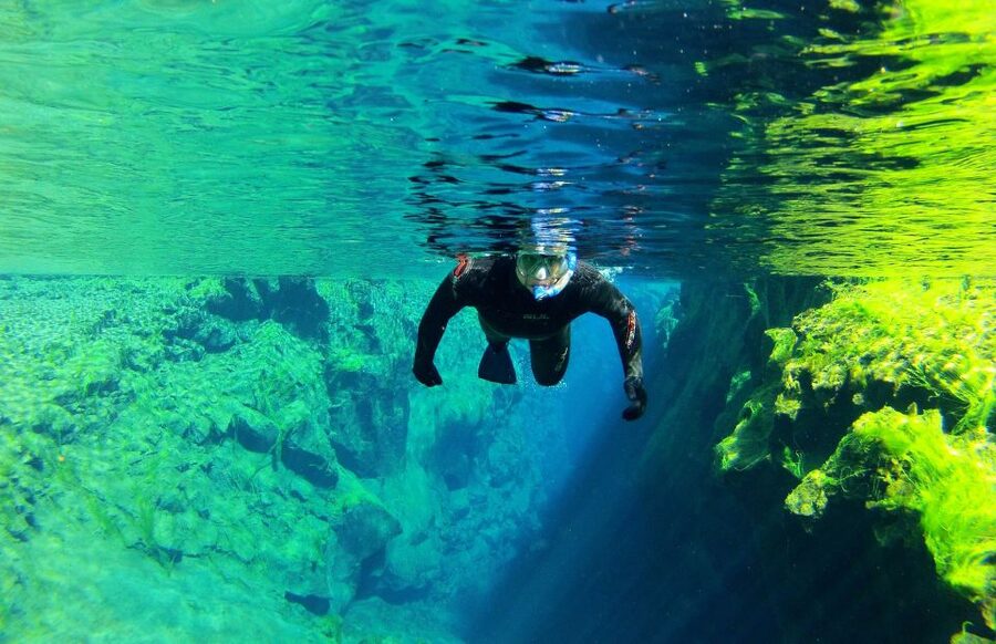 Silfra: Half-Day Snorkeling Day Trip with Underwater Photos - A calm briefing before the blue water