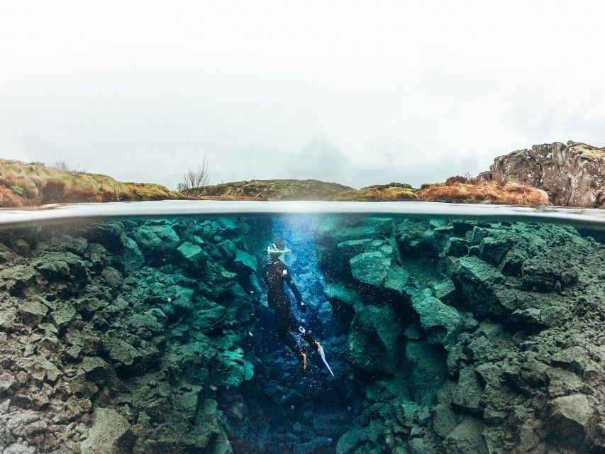 Silfra: Half-Day Snorkeling Day Trip with Underwater Photos - Floating through Silfra’s three-hour outing