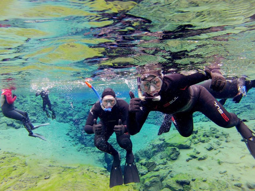 Silfra: Half-Day Snorkeling Day Trip with Underwater Photos - Photos, hot chocolate, and the parts people remember