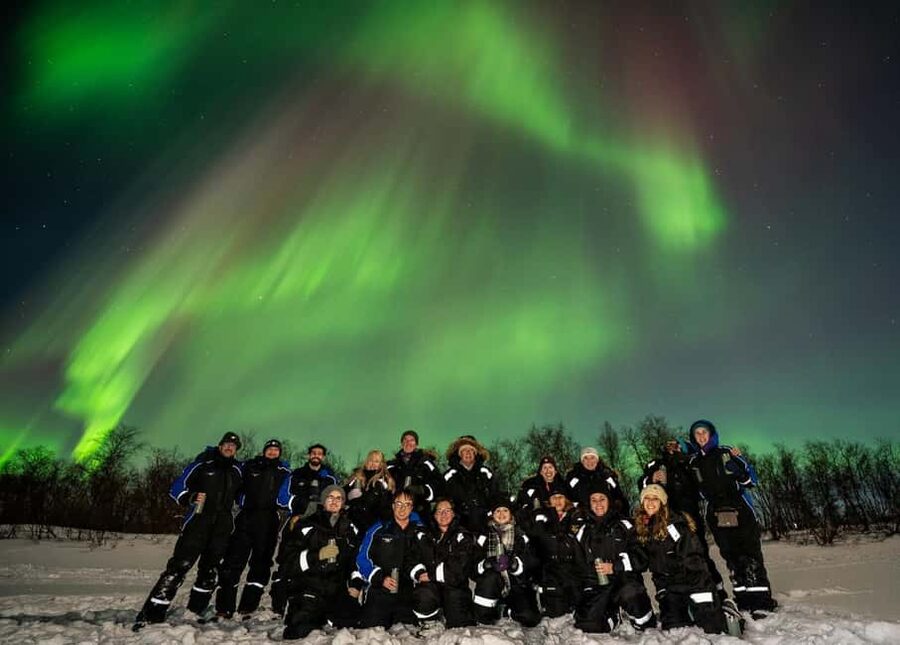 Tromsø: Northern Lights Chase + Free Professional Photos - Waiting beside the fire in Troms County