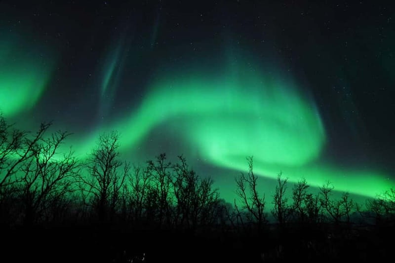 Tromsø: Northern Lights Chase with Local Guide & Free Photos - When the chase reaches Finland
