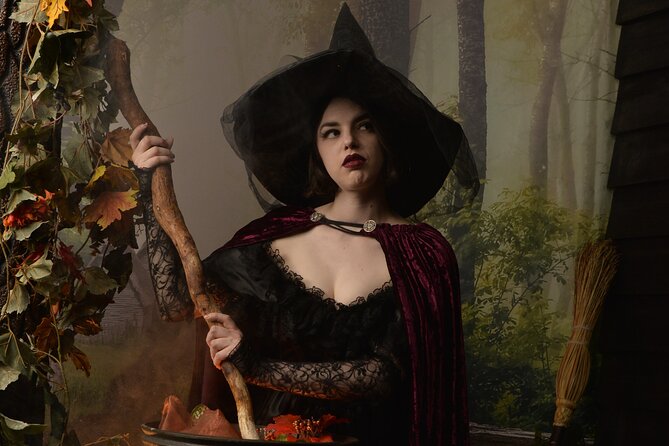 Witch Costume Photo Shoot - Olde Salem Village theatrical set - Posing beside the house, forest, and cauldron